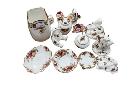 Lot 1282 - Collection of Royal Albert Old Country Roses items including animals, vase, trinket box, wheelbarrow etc