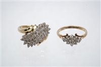 Lot 684 - Gold (14ct) diamond cluster dress ring and a...