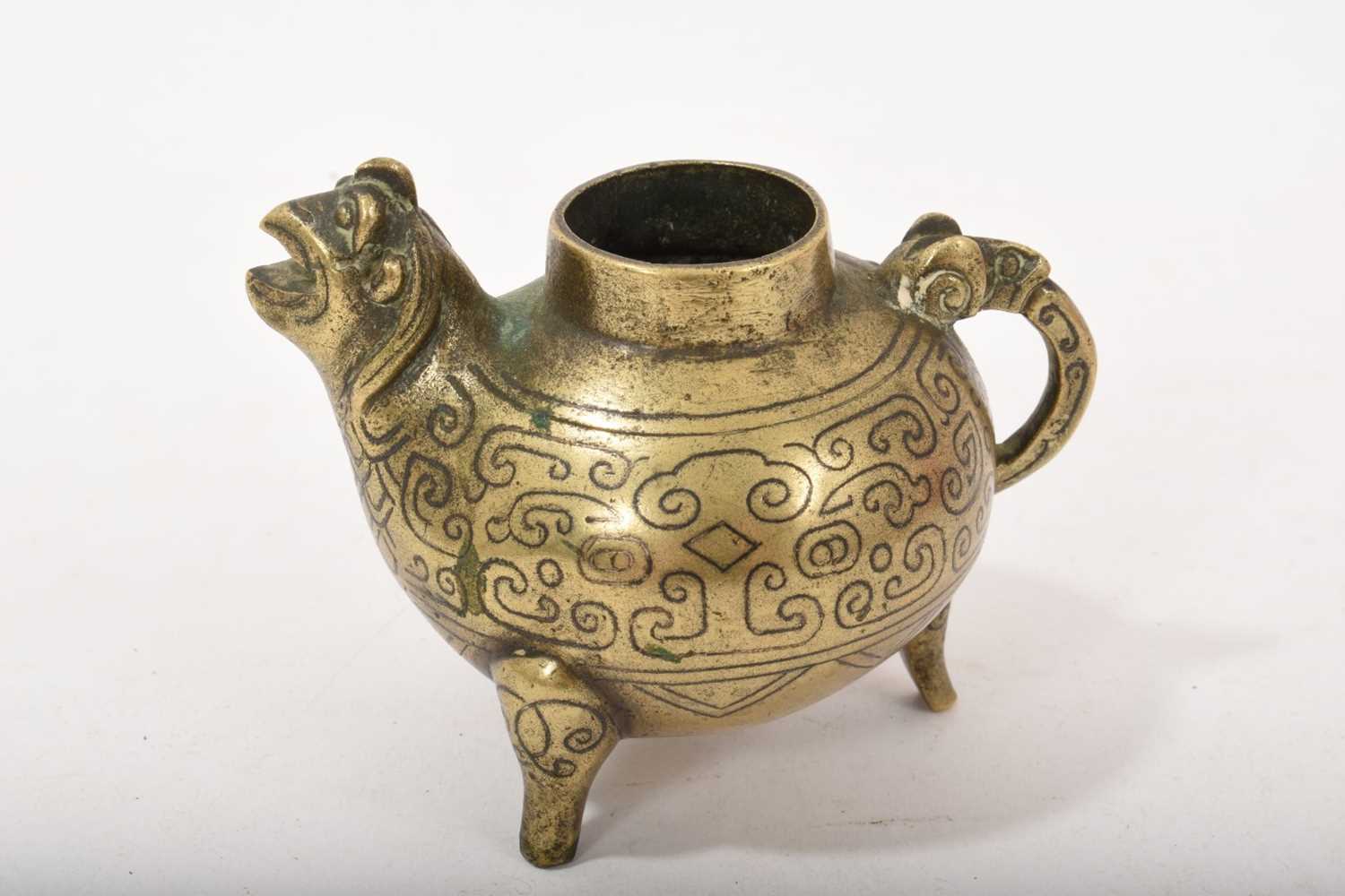 Lot 766 - Antique Chinese archaic-style bronze water dropper in the form of a bird, Zhou characters to base