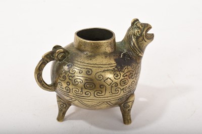 Lot 766 - Antique Chinese archaic-style bronze water dropper in the form of a bird, Zhou characters to base