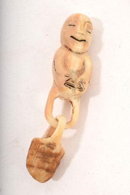 Lot 790 - Bone or tooth carving of a figure, probably Maori or Pacific, the joined hands decorated