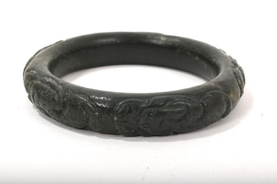 Lot 751 - Chinese jade or green hardstone bangle