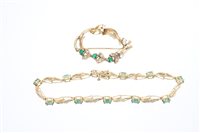 Lot 688 - Gold (9ct) emerald and diamond bracelet,...