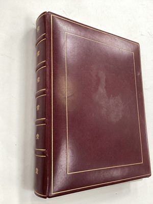 Lot 1497 - Asprey, a limited edition leather replica of The Victorian Photograph Album, no. 299 of 1000, each page with a gilded edge and reproduced images of painted flowers by Helen Riddell, 29cm (11 1/2...