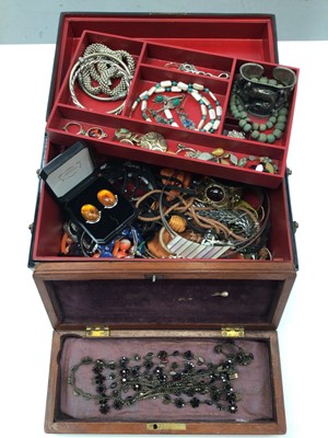 Lot 221 - Black lacquer jewellery box containing silver and white metal jewellery, amber jewellery, bangles, necklaces etc