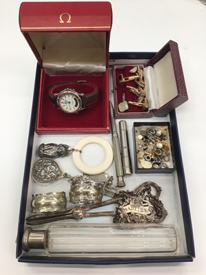 Lot 223 - Omega watch box, Casio wristwatch, various cufflinks and studs, silver identity bracelet, silver kitten rattle/ teether and some plated items