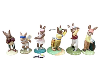 Lot 1289 - Six Royal Doulton Bunnykins figures to include three golfers, two tennis players and a boxer