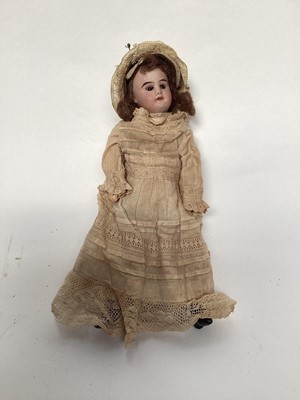 Lot 1961 - Doll small SFBJ 60 Paris 13/0 with clothing.