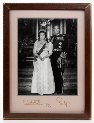 Lot 246 - H.M. Queen Elizabeth II and H.R.H. The Duke of Edinburgh, signed presentation 1992 portrait photograph in original frame