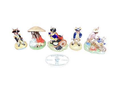 Lot 1322 - Five Royal Doulton Bunnykins figures - George Washington, Nelson, Captain Cook, Home Grown and Cuddling Under A Mushroom, together a Bunnykins plaque (6)