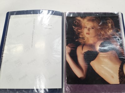 Lot 1482 - Two blue folders of glamour model photographs, Jordan, Jilly Johnson etc