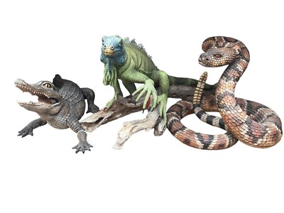 Lot 2575 - Three life-size Country Artists models of reptiles: iguana, rattle snake and baby alligator (3)