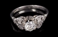 Lot 708 - 1930s Art Deco diamond single stone ring with...