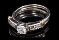 Lot 709 - Diamond single stone ring with a brilliant cut...