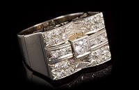 Lot 710 - Art Deco-style white gold and diamond set ring...