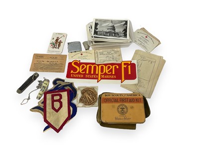 Lot 781 - Collection of American military cloth badges and sundry items including a trenching tool, uniforms and ephemera.