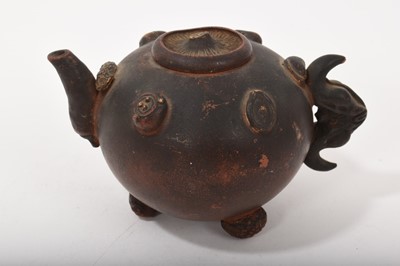 Lot 23 - Chinese Yixing globular teapot and cover, 18th / 19th century, The globular body applied with various seed pods and nuts, the handle and spout formed as a water chestnut and lotus root respectiv...