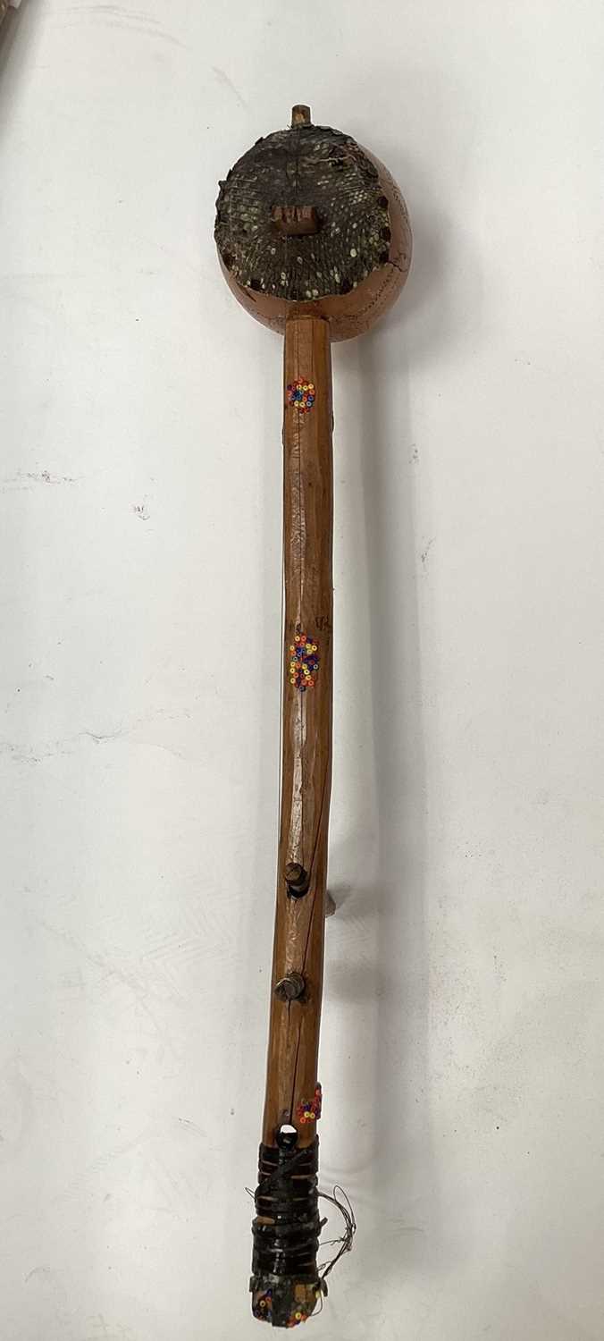 Lot 2662 - Two African instruments, brass horn,