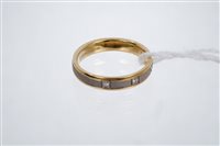 Lot 715 - 18ct white and yellow gold wedding / eternity...