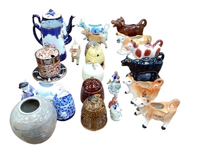 Lot 1338 - Collection of cow creamers, honey pots and other china