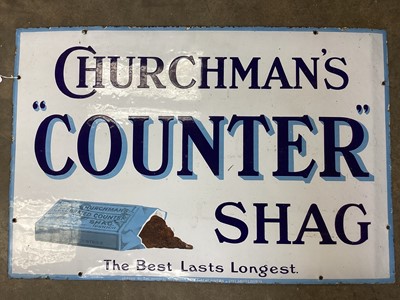 Lot 2679 - Enamel advertising sign: 'Churchman's Counter Shag - The Best Lasts Longest', 76.5cm x 51cm