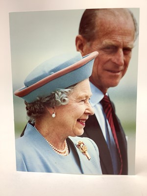 Lot 16 - H.M. Queen Elizabeth II and H.R.H. The Duke of Edinburgh, signed 1993 Christmas card with gilt embossed Royal cyphers to the interior cover, colour photograph to the cover of The Queen beside Pr...