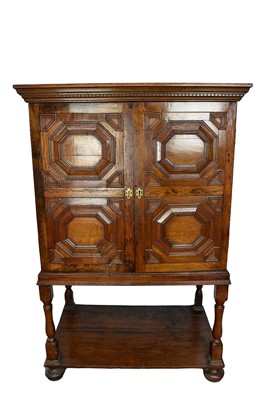 Lot 1184 - Geometric moulded oak cabinet, with early elements