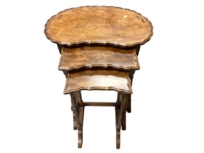 Lot 1353 - Nest of three burr walnut occasional tables