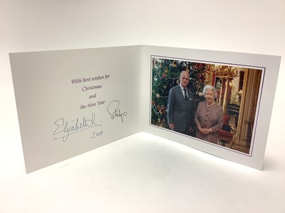 Lot 33 - H.M. Queen Elizabeth II and H.R.H. The Duke of Edinburgh, signed 2010 Christmas card with twin gilt Royal cyphers to the cover, colour photograph to the interior of the Royal couple in Buckingham...