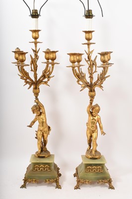 Lot 699 - Pair of gilt metal and alabaster candelabra