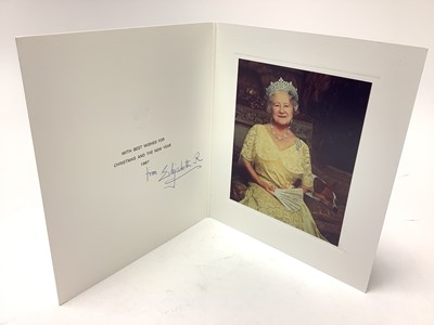 Lot 45 - H.M. Queen Elizabeth The Queen Mother, signed 1987 Christmas card with gilt embossed crown to cover, colour photograph of Her Majesty wearing a ball gown with a sleeping corgi beside her, signed...