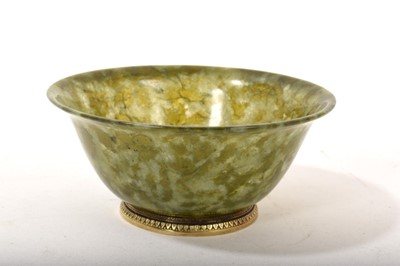 Lot 873 - Spinach jade bowl with silver Russian-style mounts