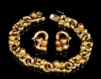 Lot 735 - Garrard gold (18ct) bracelet and matching...