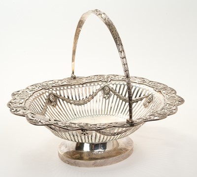 Lot 207 - Late Victorian silver swing handled cake basket