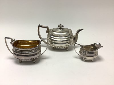 Lot 215 - Composite George III silver three piece teaset