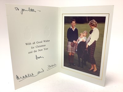 Lot 62 - T.R.H. The Prince and Princess of Wales, signed 1985 Christmas card with twin gilt Royal cyphers to cover, colour photograph of the smiling couple with their two young sons on a Shetland pony, si...