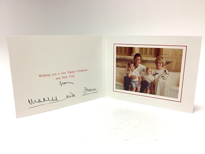 Lot 64 - T.R.H. The Prince and Princess of Wales, signed 1987 Christmas card with twin gilt Royal cyphers to cover, colour photograph of the smiling couple with their two young sons on holiday in Spain, s...