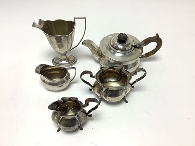 Lot 227 - Silver teapot, two jugs and matching jug and sugar bowl