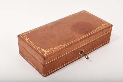 Lot 566 - Italian tooled leather jewellery box with velvet interior and key, 21cm x 10cm x 5.5cm