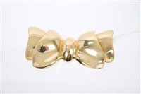 Lot 741 - 18ct yellow gold bow brooch / pendant, by...