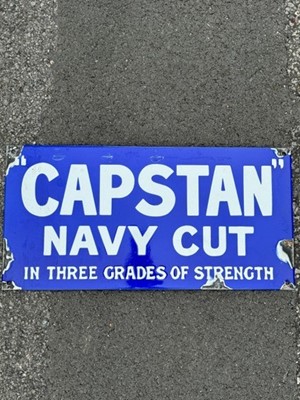 Lot 90 - Reproduction Capstan Navy Cut blue and white enamel advertising sign, 46cm x 23cm.