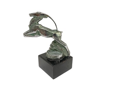 Lot 43 - Art Deco chromium plated car mascot in the form of a leaping stag, signed E. J. Baye, mounted on a wooden base, the mascot 13.8cm in overall height (excluding base).