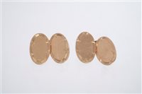 Lot 747 - Pair rose gold (9ct) cufflinks, the oval...