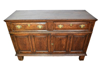 Lot 1159 - Early 18th century oak dresser base, with fielded panels