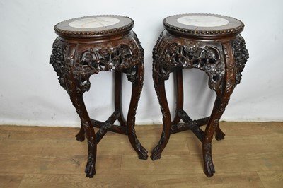 Lot 1164 - Pair of Chinese carved hardwood stands