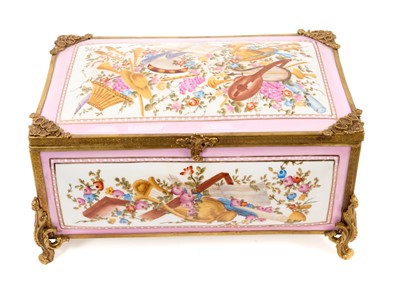 Lot 74 - Russian Gardner porcelain brass-mounted jewellery box, painted with musical instruments and flowers