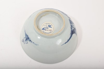 Lot 69 - Chinese blue and white porcelain bowl from the Nanking Cargo, painted with a landscape, label to base, 15cm diameter