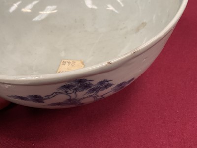 Lot 69 - Chinese blue and white porcelain bowl from the Nanking Cargo, painted with a landscape, label to base, 15cm diameter