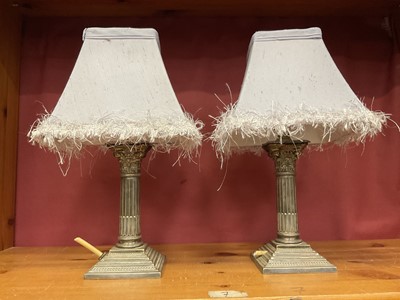 Lot 214 - Pair of antique silver plated lamps in the form of Corinthian columns