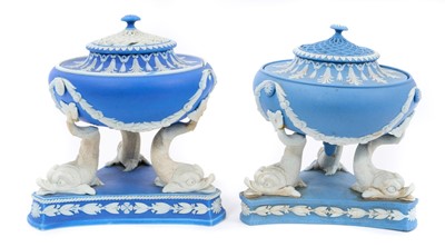 Lot 36 - A rare near pair of Wedgwood jasperware pastille burners, circa 1805, the burners supported by three stylised dolphins, decorated with swags and foliate patterns, the first marked 'Josiah Wedgwo...